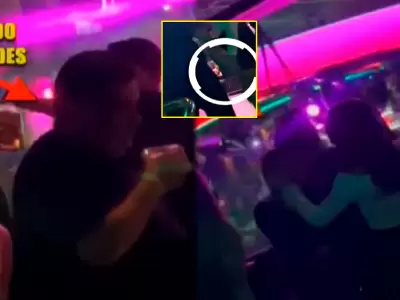 Alfredo Benavides ampayado tomado de la mano con una joven en Barranco.