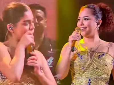 Cielo Fern�ndez destapa una botella de cerveza con los dientes